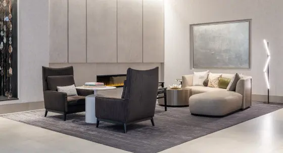 Modern Burlington Square hotel lounge with comfortable seating, fireplace, and contemporary décor